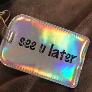Bitzy luggage tag! Completely new and unused. Can hold things like cards.